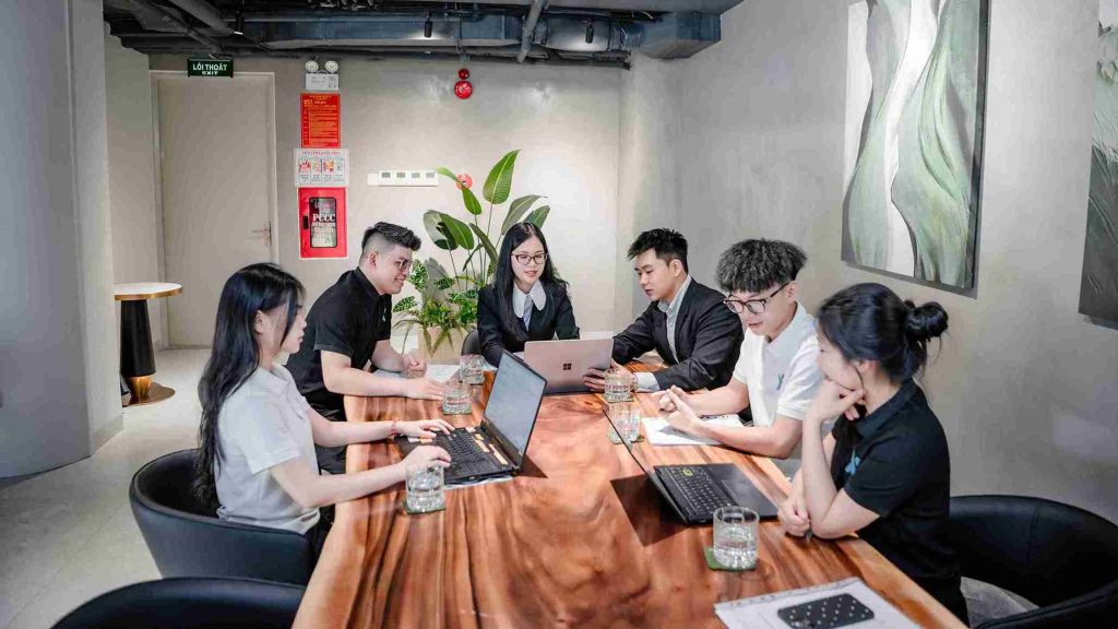 XNOR Group’s QA team performing multi-device software testing with test automation and bug tracking tools.