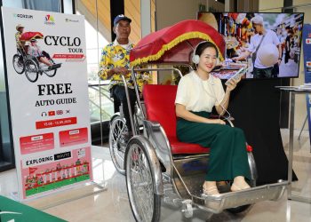 AI voice technology device on Da Nang cyclo tour